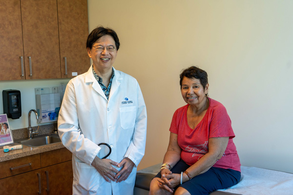 Dr. Ueno with a patient